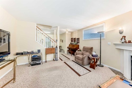 4514 54A Ave Cres, Innisfail, AB - Indoor With Fireplace