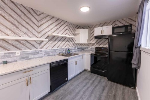 5910 50 Avenue, Stettler, AB - Indoor Photo Showing Kitchen