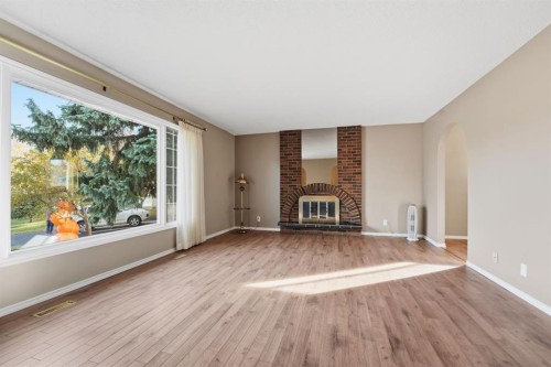 20 Allsop Close, Red Deer, AB - Indoor Photo Showing Living Room With Fireplace