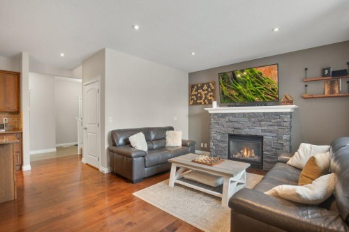 125 Traptow Close, Red Deer, AB - Indoor Photo Showing Living Room With Fireplace