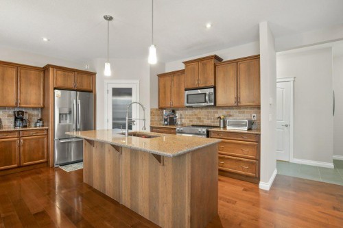 125 Traptow Close, Red Deer, AB - Indoor Photo Showing Kitchen With Double Sink With Upgraded Kitchen