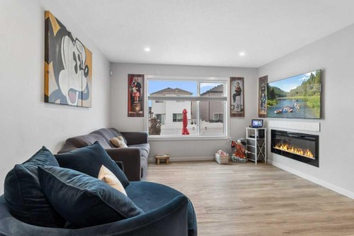 33 Earl Close, Red Deer, AB - Indoor Photo Showing Living Room With Fireplace