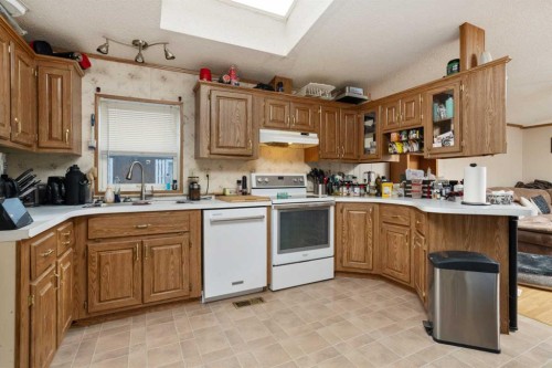 5233 47 Street, Camrose, AB - Indoor Photo Showing Kitchen With Double Sink