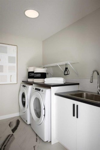 279 Ambledale Drive Nw, Calgary, AB - Indoor Photo Showing Laundry Room