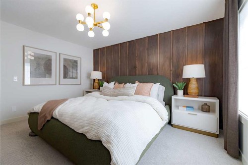 257 Amblestone Crescent Nw, Calgary, AB - Indoor Photo Showing Bedroom