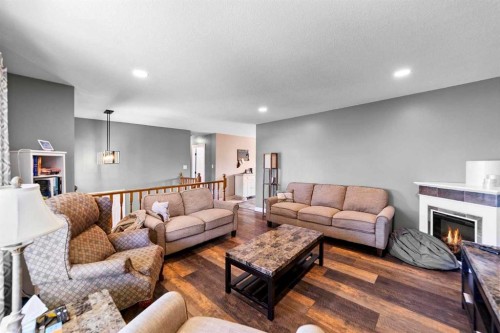 5419 53 Street, Camrose, AB - Indoor Photo Showing Living Room With Fireplace