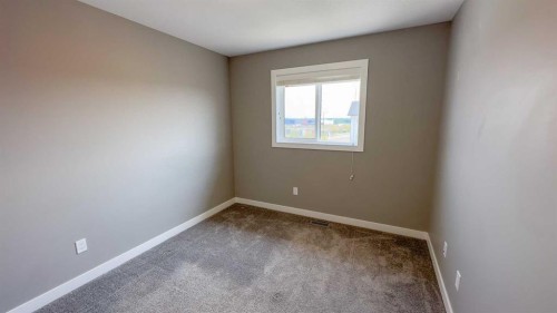 5 Iron Gate Boulevard, Sylvan Lake, AB - Indoor Photo Showing Other Room