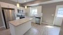 5 Iron Gate Boulevard, Sylvan Lake, AB  - Indoor Photo Showing Kitchen With Upgraded Kitchen 