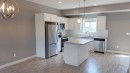 5 Iron Gate Boulevard, Sylvan Lake, AB  - Indoor Photo Showing Kitchen With Upgraded Kitchen 