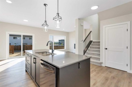 126 Norseman Close, Penhold, AB - Indoor Photo Showing Kitchen With Double Sink
