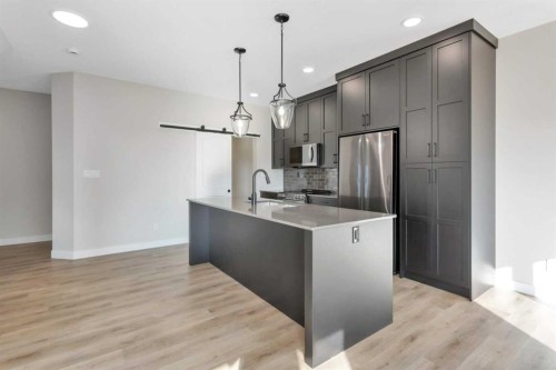 126 Norseman Close, Penhold, AB - Indoor Photo Showing Kitchen With Upgraded Kitchen