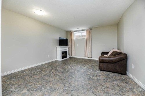 5 Michener Place, Red Deer, AB - Indoor With Fireplace