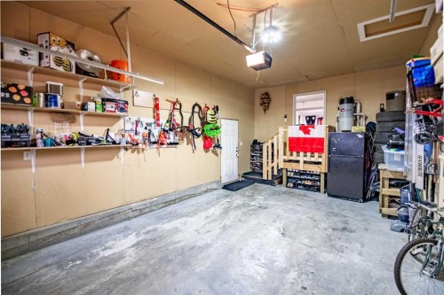 24-45 Ironstone Drive, Red Deer, AB - Indoor Photo Showing Garage
