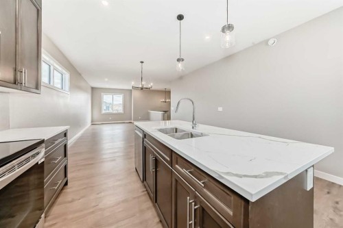 18 Tagish Avenue, Red Deer, AB - Indoor Photo Showing Kitchen With Double Sink