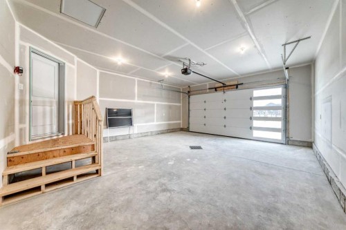 18 Tagish Avenue, Red Deer, AB - Indoor Photo Showing Garage