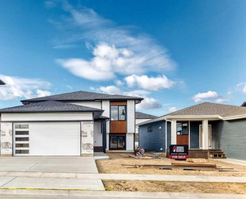 18 Tagish Avenue, Red Deer, AB - Outdoor With Facade