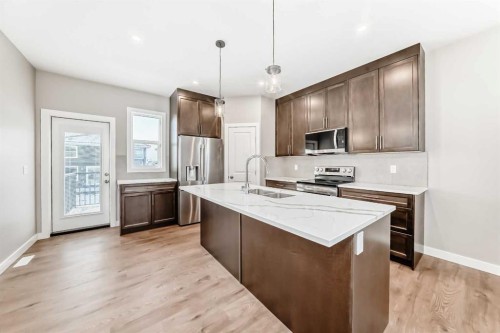18 Tagish Avenue, Red Deer, AB - Indoor Photo Showing Kitchen With Stainless Steel Kitchen With Double Sink With Upgraded Kitchen