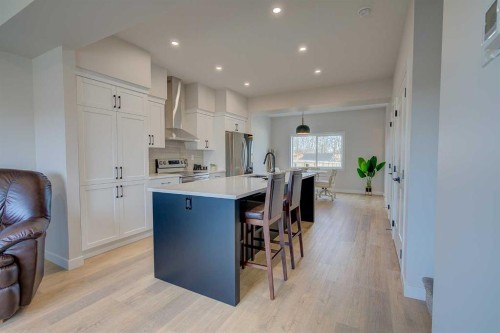 103 Gray Close, Sylvan Lake, AB - Indoor Photo Showing Kitchen With Upgraded Kitchen