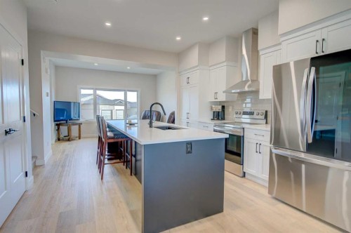 103 Gray Close, Sylvan Lake, AB - Indoor Photo Showing Kitchen With Stainless Steel Kitchen With Upgraded Kitchen