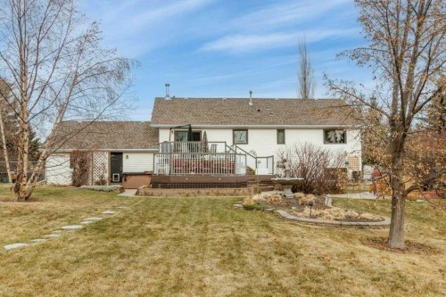 45 Ravenscrag Crescent North, Norglenwold, AB - Outdoor With Deck Patio Veranda