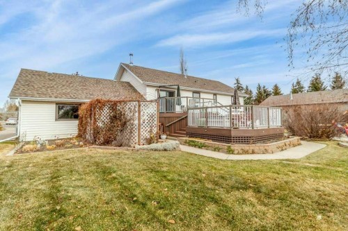 45 Ravenscrag Crescent North, Norglenwold, AB - Outdoor With Deck Patio Veranda