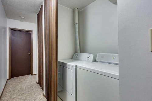 5418 And 5422 48 Avenue, Olds, AB - Indoor Photo Showing Laundry Room