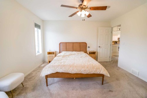 11 Falcon Ridge Drive, Sylvan Lake, AB - Indoor Photo Showing Bedroom