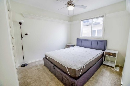 11 Falcon Ridge Drive, Sylvan Lake, AB - Indoor Photo Showing Bedroom