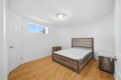 11 Falcon Ridge Drive, Sylvan Lake, AB - Indoor Photo Showing Bedroom