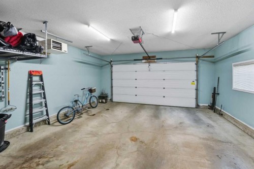 90 Allison Crescent, Red Deer, AB - Indoor Photo Showing Garage