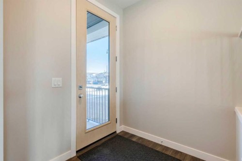 311 Dawson Dock Way, Chestermere, AB - Indoor Photo Showing Other Room