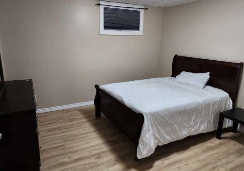 170 Hopegood Drive, Anzac, AB - Indoor Photo Showing Bedroom