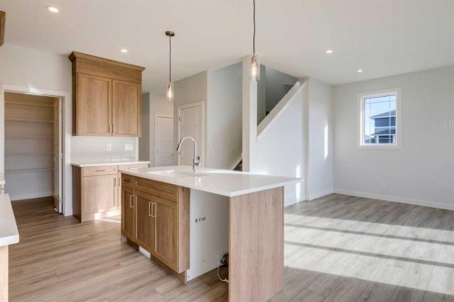 303 Dawson Dock Way, Chestermere, AB - Indoor Photo Showing Kitchen