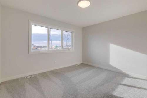 303 Dawson Dock Way, Chestermere, AB - Indoor Photo Showing Other Room