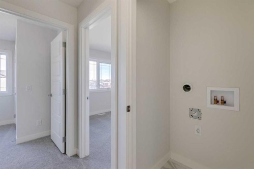 303 Dawson Dock Way, Chestermere, AB - Indoor Photo Showing Other Room