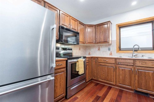 50 Ramsey Avenue, Red Deer, AB - Indoor Photo Showing Kitchen With Double Sink