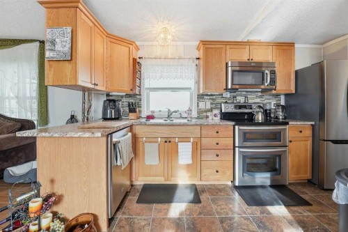 211-37543 England Way, Rural Red Deer County, AB 