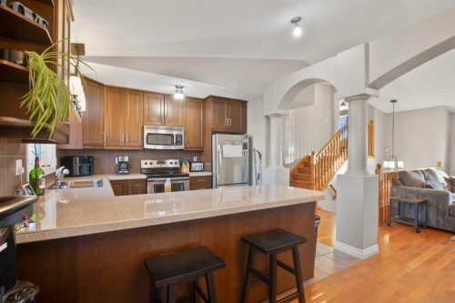 2 Holbrook Place, Sylvan Lake, AB - Indoor Photo Showing Kitchen With Double Sink