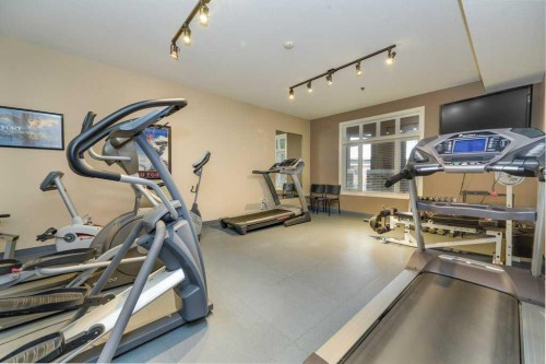 404-5213 61 Street, Red Deer, AB - Indoor Photo Showing Gym Room