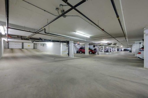 404-5213 61 Street, Red Deer, AB - Indoor Photo Showing Garage