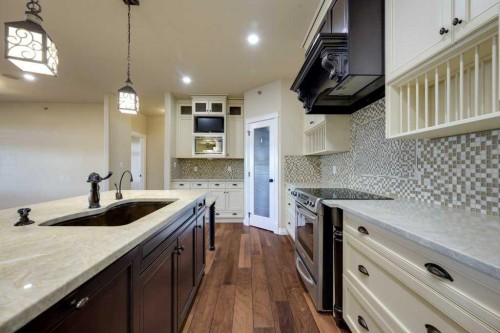 404-5213 61 Street, Red Deer, AB - Indoor Photo Showing Kitchen With Upgraded Kitchen