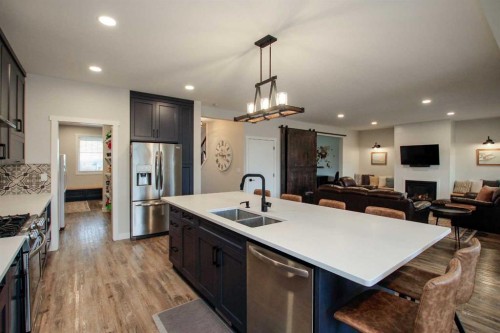652 Bridgeview Road, Rural Ponoka County, AB - Indoor Photo Showing Kitchen With Stainless Steel Kitchen With Double Sink With Upgraded Kitchen