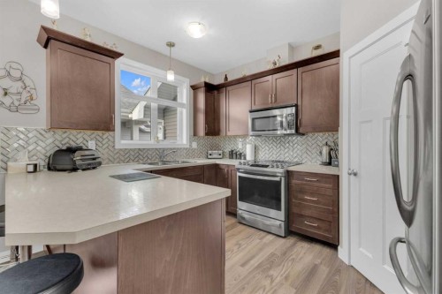 3901 49 Ave, Ponoka, AB - Indoor Photo Showing Kitchen With Double Sink With Upgraded Kitchen