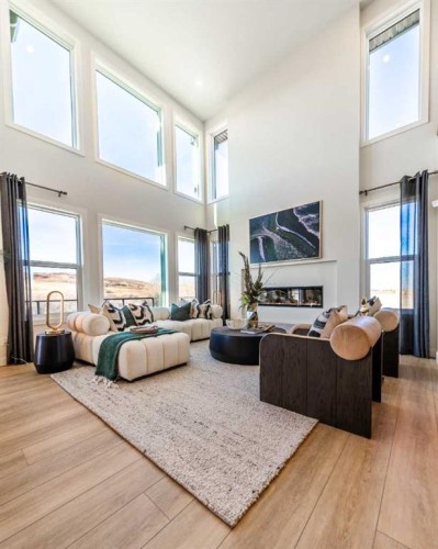 79 Amber View, Balzac, AB - Indoor Photo Showing Living Room With Fireplace