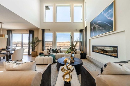 79 Amber View, Balzac, AB - Indoor Photo Showing Living Room With Fireplace