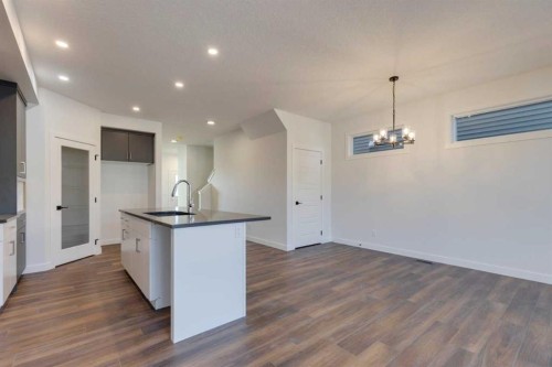 495 Lawthorn Way Se, Airdrie, AB - Indoor Photo Showing Kitchen With Upgraded Kitchen