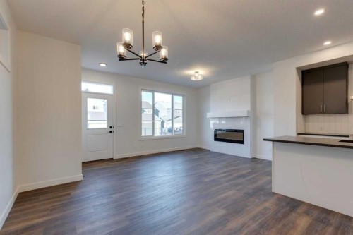 495 Lawthorn Way Se, Airdrie, AB - Indoor With Fireplace