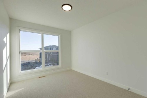 495 Lawthorn Way Se, Airdrie, AB - Indoor Photo Showing Other Room