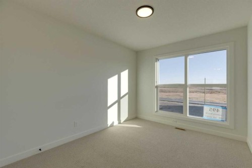 495 Lawthorn Way Se, Airdrie, AB - Indoor Photo Showing Other Room