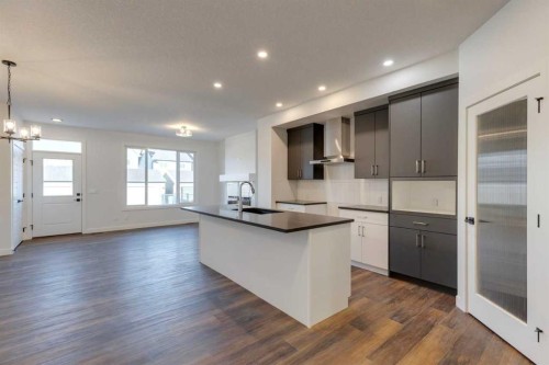 495 Lawthorn Way Se, Airdrie, AB - Indoor Photo Showing Kitchen With Upgraded Kitchen